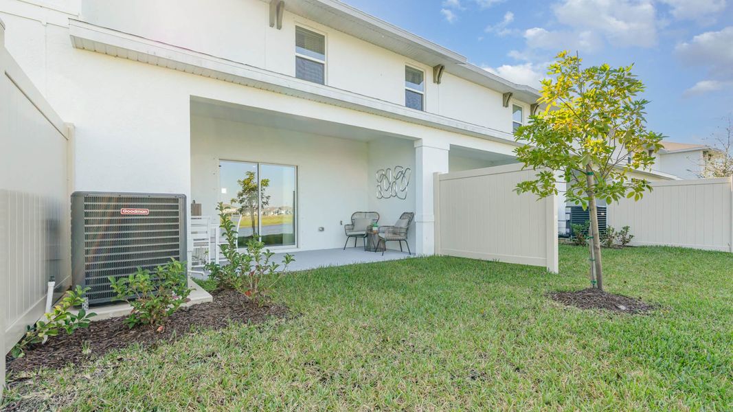 Exterior details of a home in Central Park Townhomes, Port St. Lucie (Image 5).