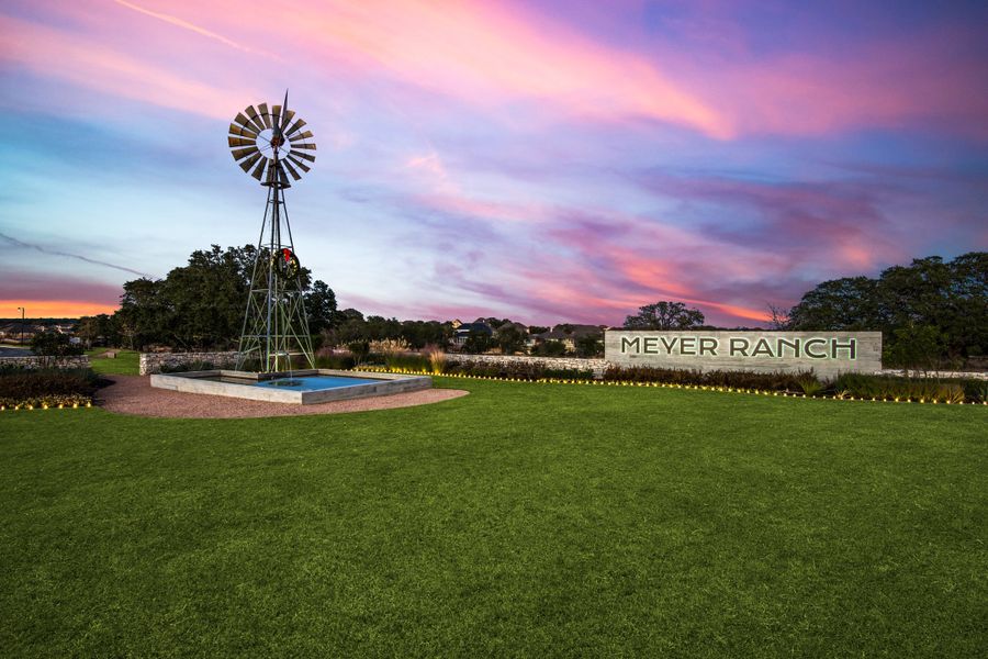 Entrance to the Meyer Ranch community in New Braunfels, TX, featuring signage and landscaping (Image 15).