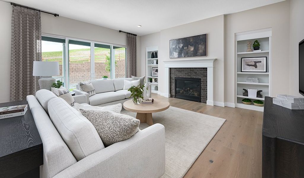 Furnished interior in a model home at Chateau at the Meadows in Castle Rock (Image 3).