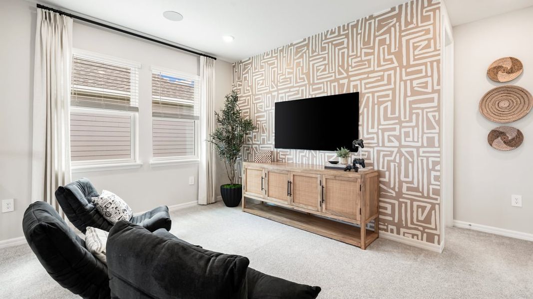 Furnished interior in a model home at Firethorn in Parrish (Image 14).