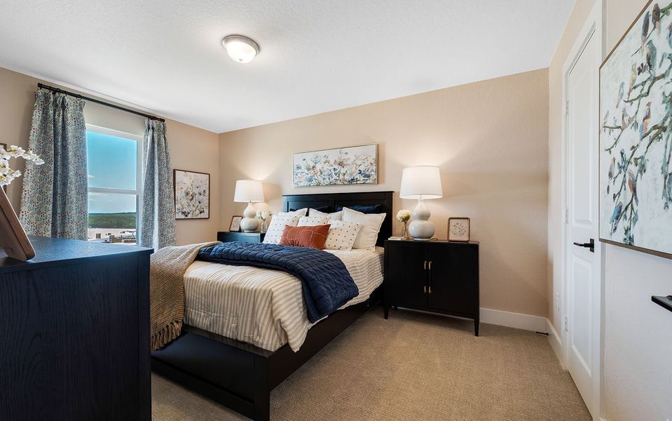 Furnished interior in a model home at The Woodlands at Medina Hills in Mico (Image 27). Furnished interior in a model home at The Woodlands at Medina Hills in Mico (Image 27).