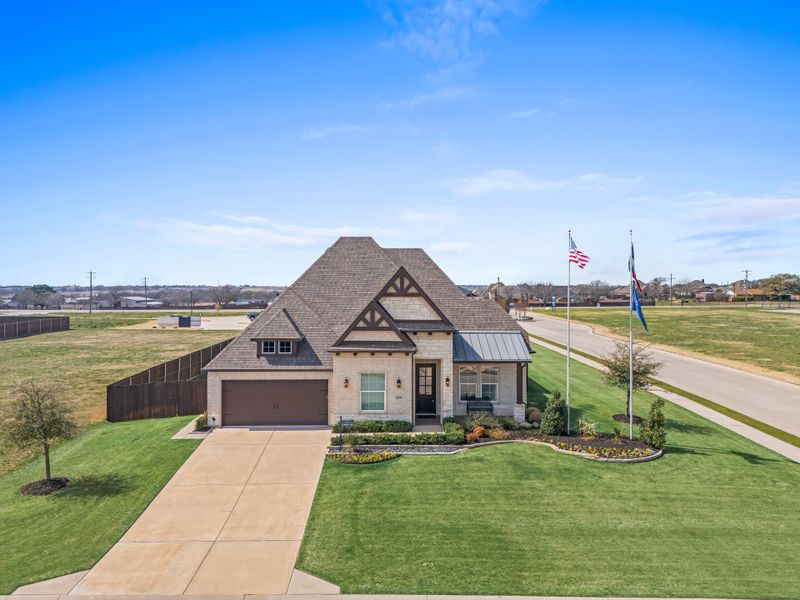 Front exterior of a home in the Coyote Crossing community, located in Godley, TX (Image 4).