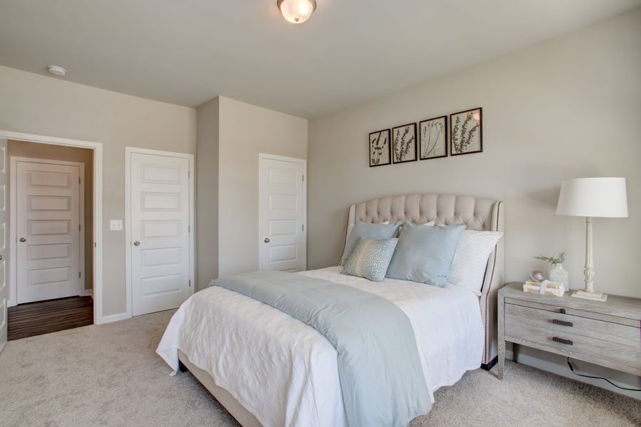 Furnished interior in a model home at Legends at Old Monroe in Monroe (Image 20).