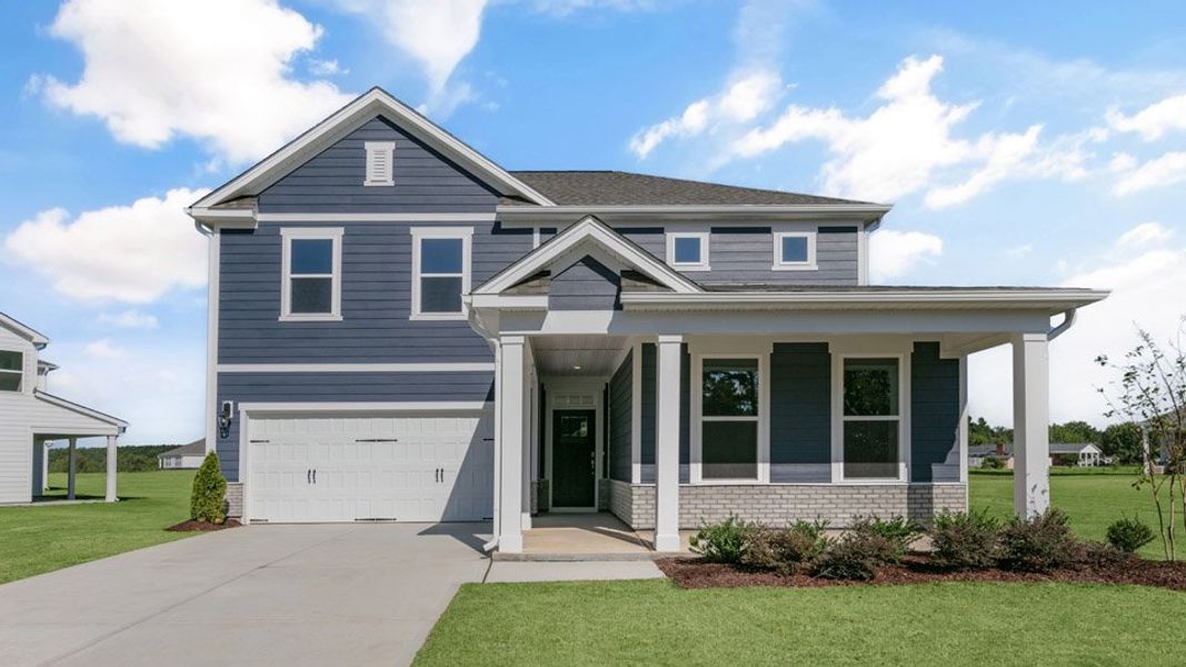 Front exterior of a home in the Eagle Creek community, located in Fuquay Varina, NC (Image 10).