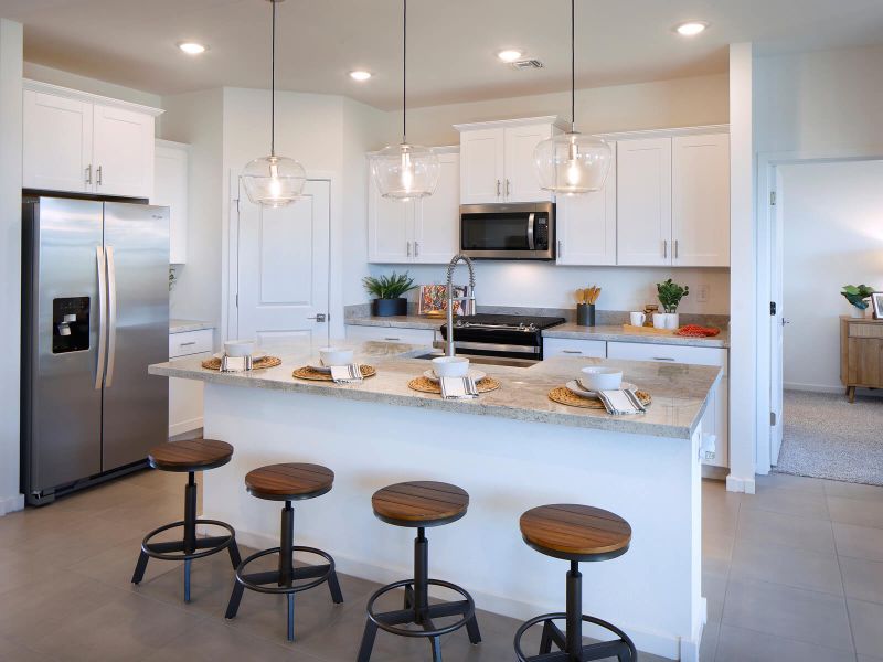 Furnished interior in a model home at Entrada Estate Series in Tolleson (Image 17).