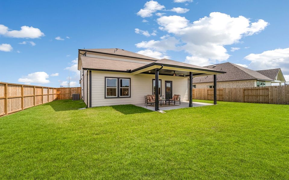 Front exterior of a home in the Harvest Pointe community, located in Needville, TX (Image 9).