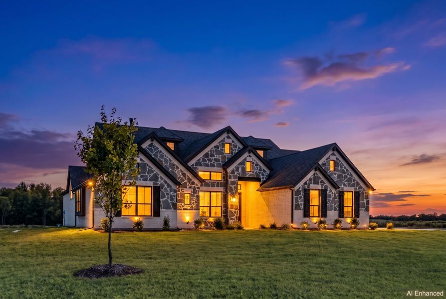 Front exterior of a home in the Panther Trail community, located in Van Alstyne, TX (Image 12).