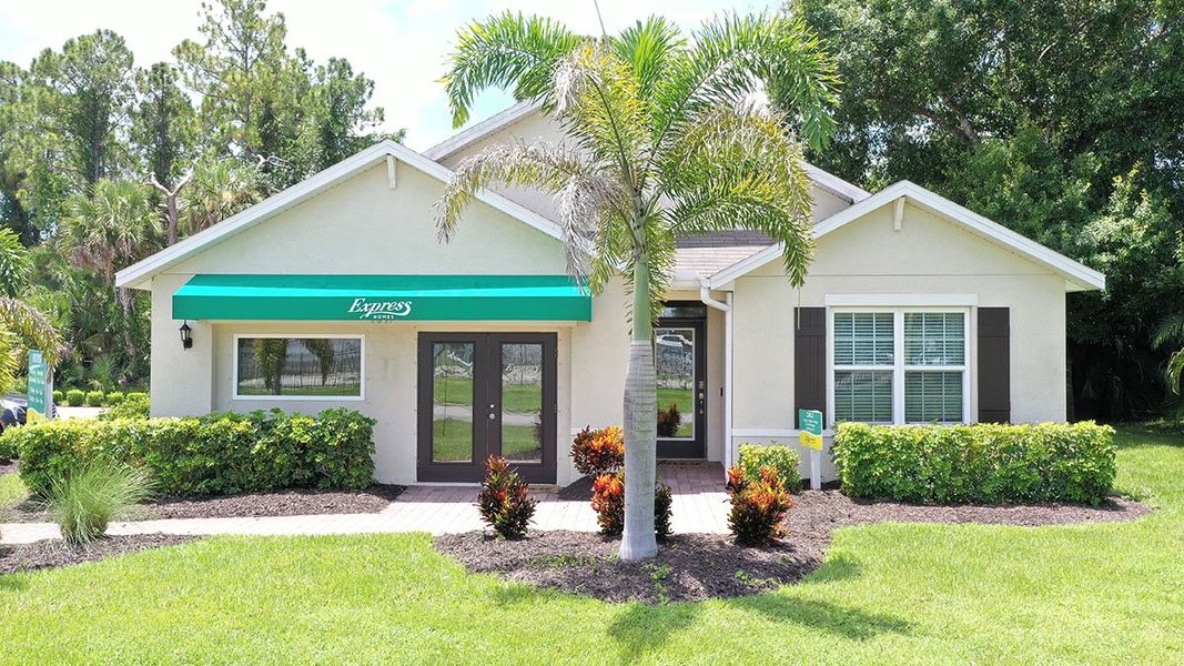 Front exterior of a home in the North Port - Express Series community, located in North Port, FL (Image 1). Front exterior of a home in the North Port - Express Series community, located in North Port, FL (Image 1).