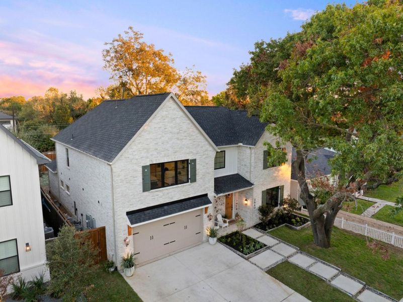 Front exterior of a home in the Bluff Hollow community, located in Plano, TX (Image 4).