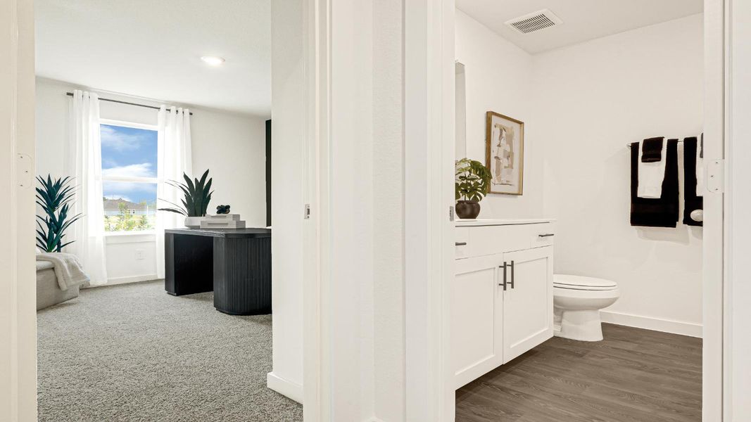 Furnished interior in a model home at Blue Heron Estates in Beasley (Image 8).