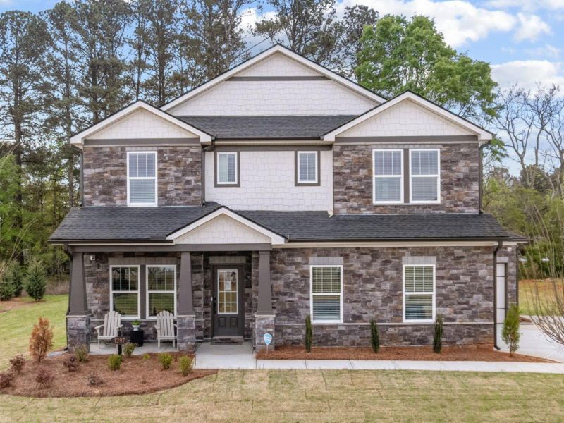 Front exterior of a home in the River Pointe community, located in Monroe, GA (Image 2). Front exterior of a home in the River Pointe community, located in Monroe, GA (Image 2).