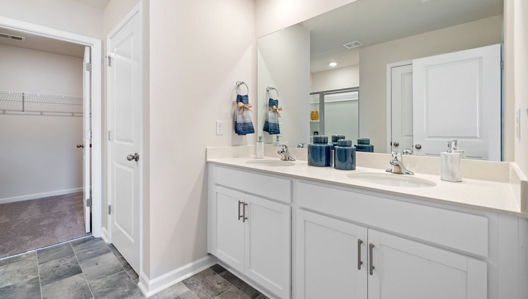 Furnished interior in a model home at Treemont Commons in Wellford (Image 20).