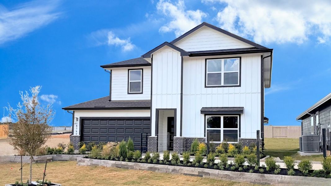 Front exterior of a home in the Chapel Lakes community, located in Montgomery, TX (Image 3). Front exterior of a home in the Chapel Lakes community, located in Montgomery, TX (Image 3).