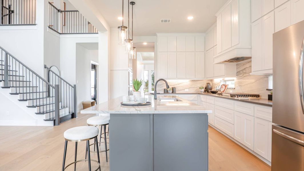 Furnished interior in a model home at Collinsbrook Farm in Frisco (Image 15).