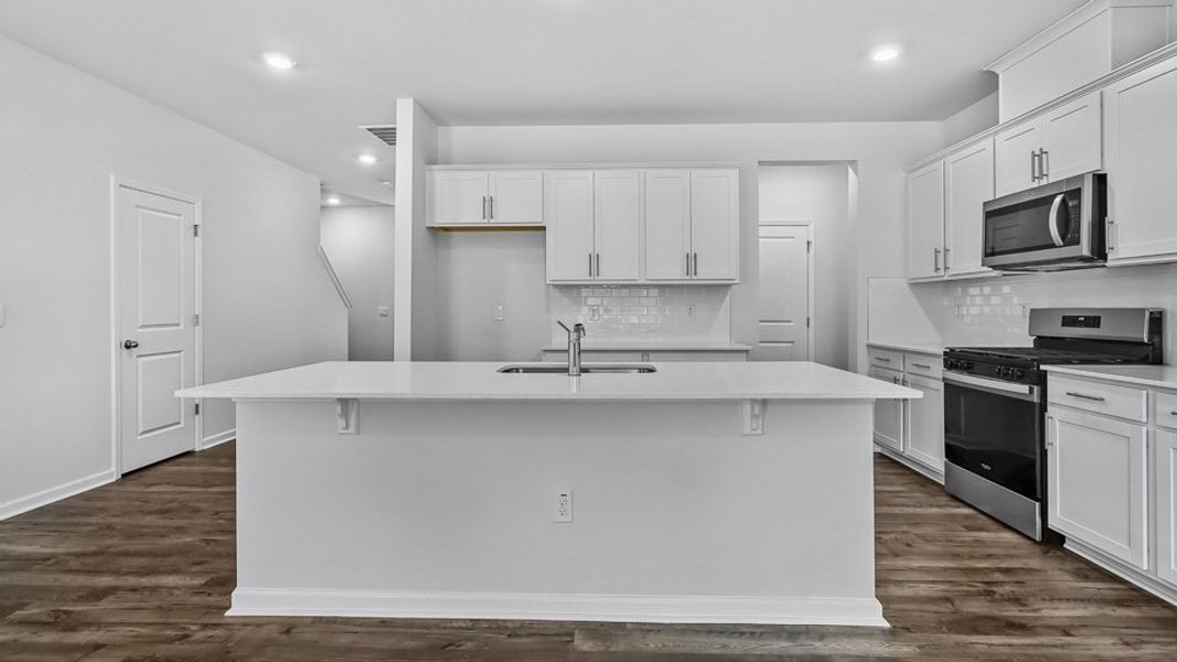 Furnished interior in a model home at The Townes Park in Apex (Image 23). Furnished interior in a model home at The Townes Park in Apex (Image 23).