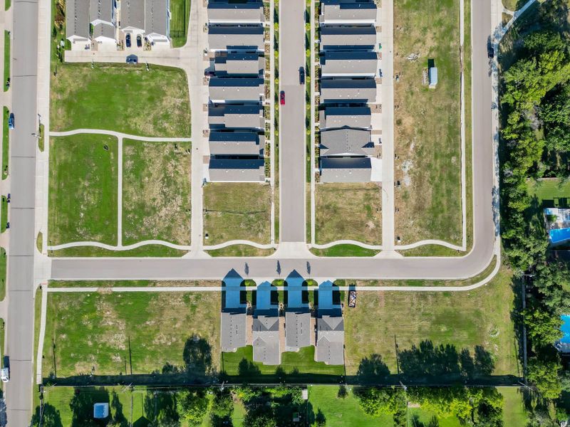 Aerial view of the Heritage Commons community in Andover, KS, showing layout and nearby surroundings (Image 22). Aerial view of the Heritage Commons community in Andover, KS, showing layout and nearby surroundings (Image 22).