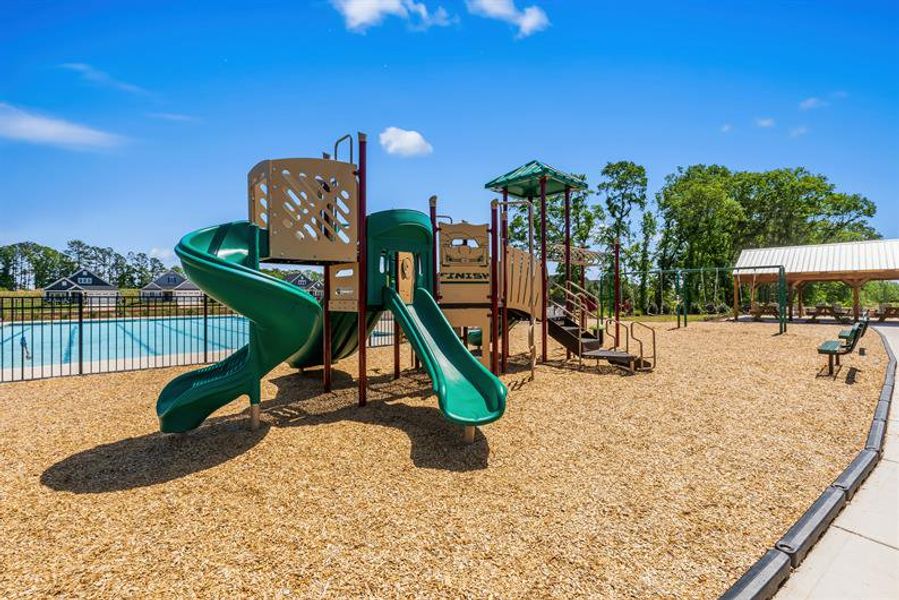 Gather the kids and chat with neighbors at the playground. Gather the kids and chat with neighbors at the playground.
