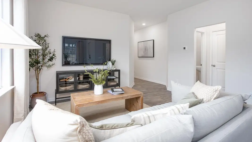 Furnished interior in a model home at The Townes at Riley's Meadow in Haw River (Image 5).