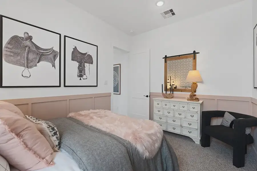 Furnished interior in a model home at Brookewater 60's in Rosenberg (Image 28).