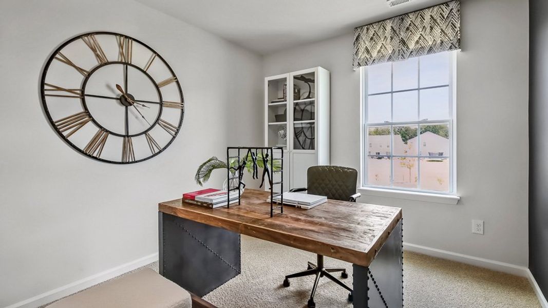 Furnished interior in a model home at The Townes at Prestleigh in Wake Forest (Image 23).