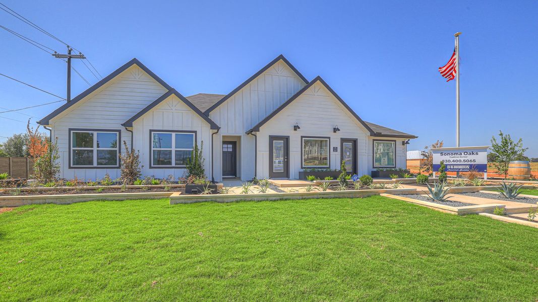 Front exterior of a home in the Sonoma Oaks community, located in Fredericksburg, TX (Image 1).