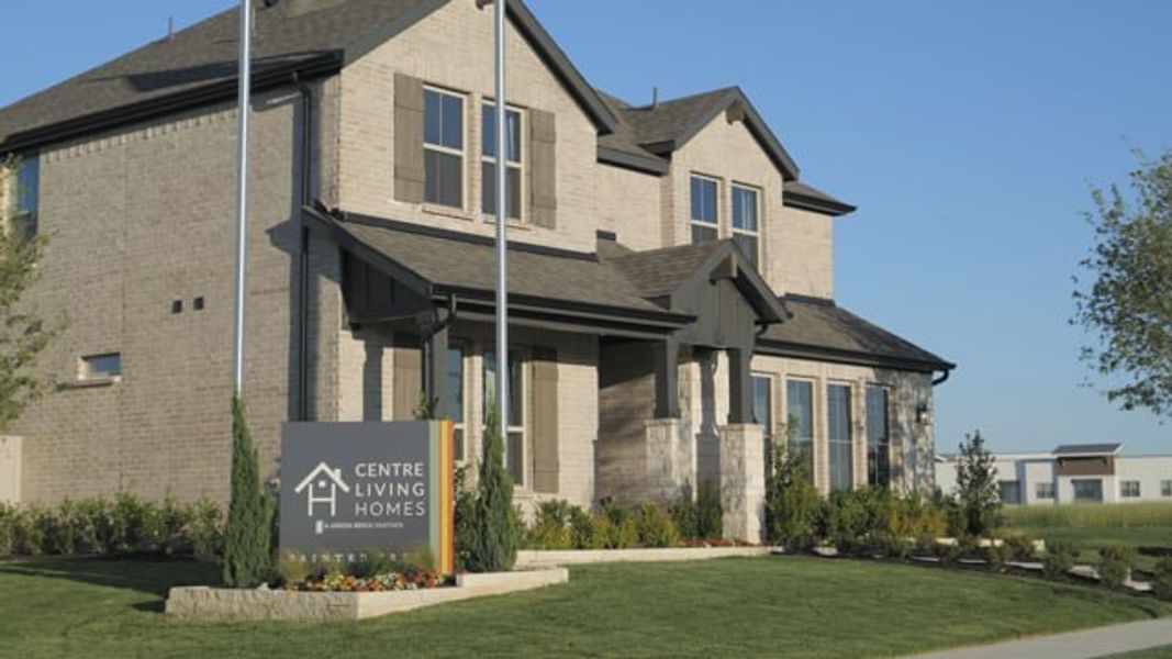 Front exterior of a home in the Painted Tree Woodland West community, located in McKinney, TX (Image 2). Front exterior of a home in the Painted Tree Woodland West community, located in McKinney, TX (Image 2).