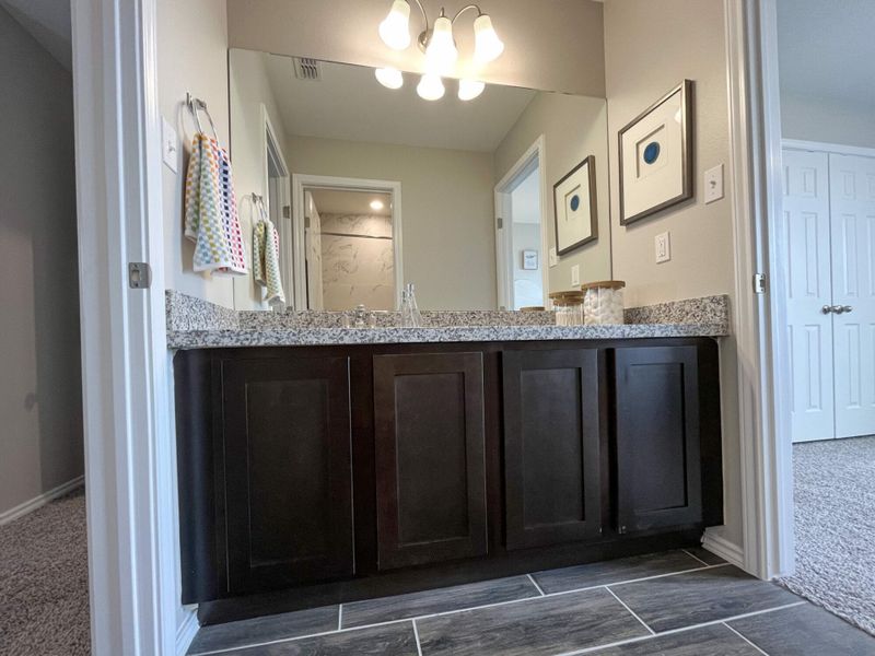 Furnished interior in a model home at Villas San Agustin in Laredo (Image 12).