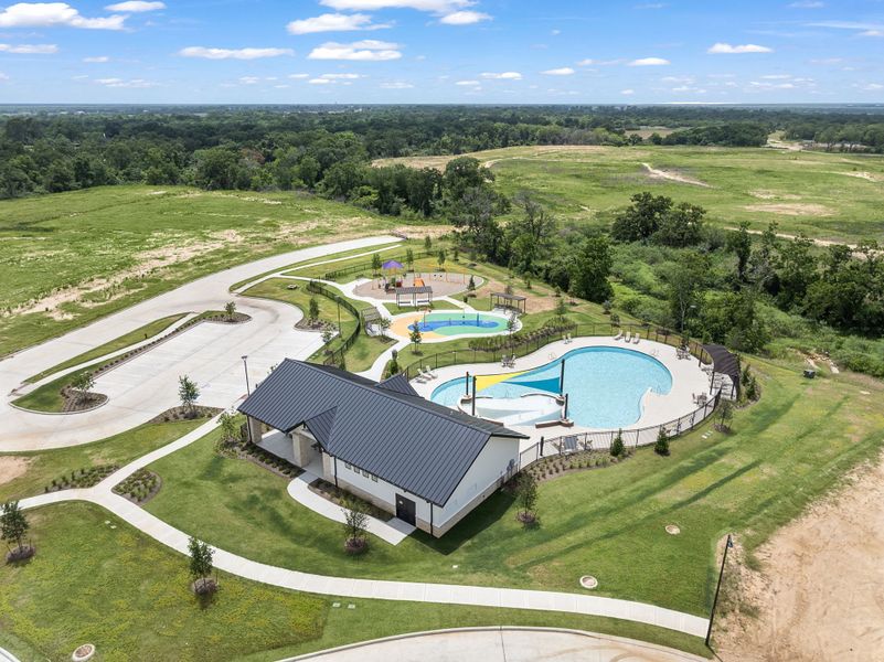 A swimming pool in a golf course.
