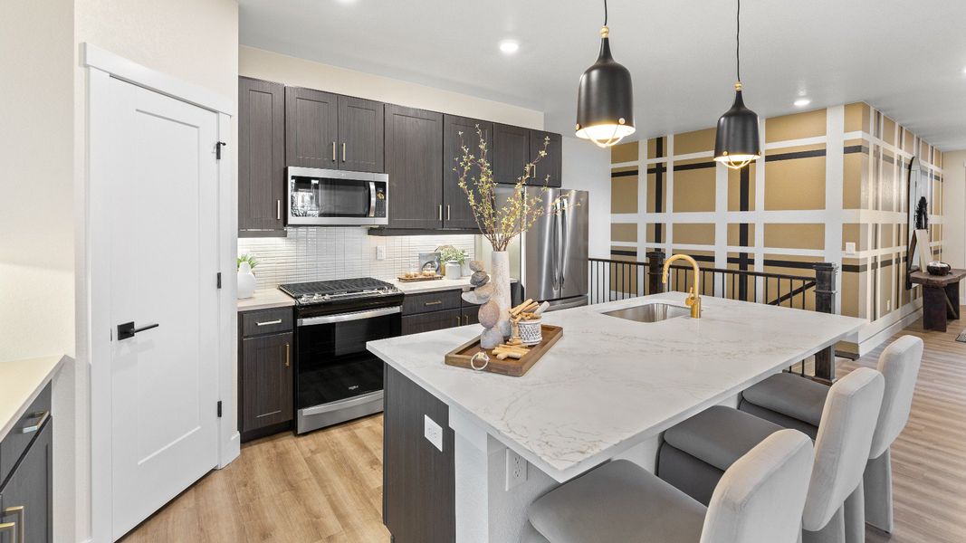 Furnished interior in a model home at Granary in Johnstown (Image 8).
