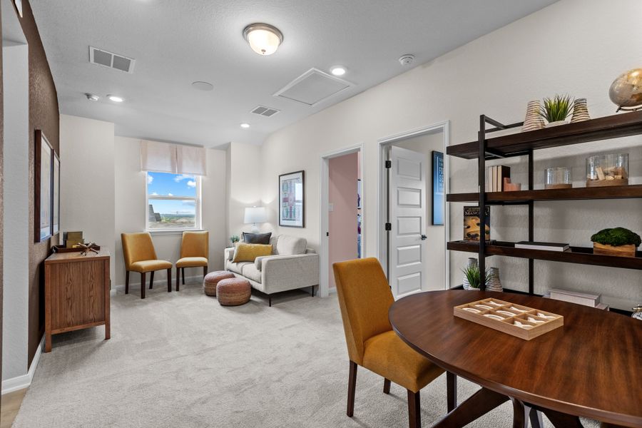 Furnished interior in a model home at Venado Crossing in Cibolo (Image 3).