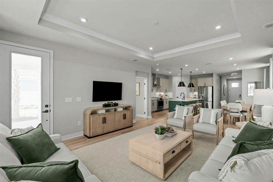 THE FAMILY ROOM HAS ENOUGH SPACE TO ENTERTAIN FRIENDS AND FAMILY FOR ALL LIFE'S OCCASIONS