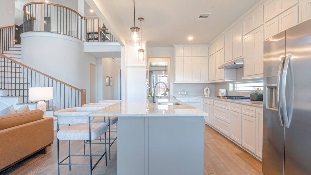 Furnished interior in a model home at Brookfield in Melissa (Image 8).