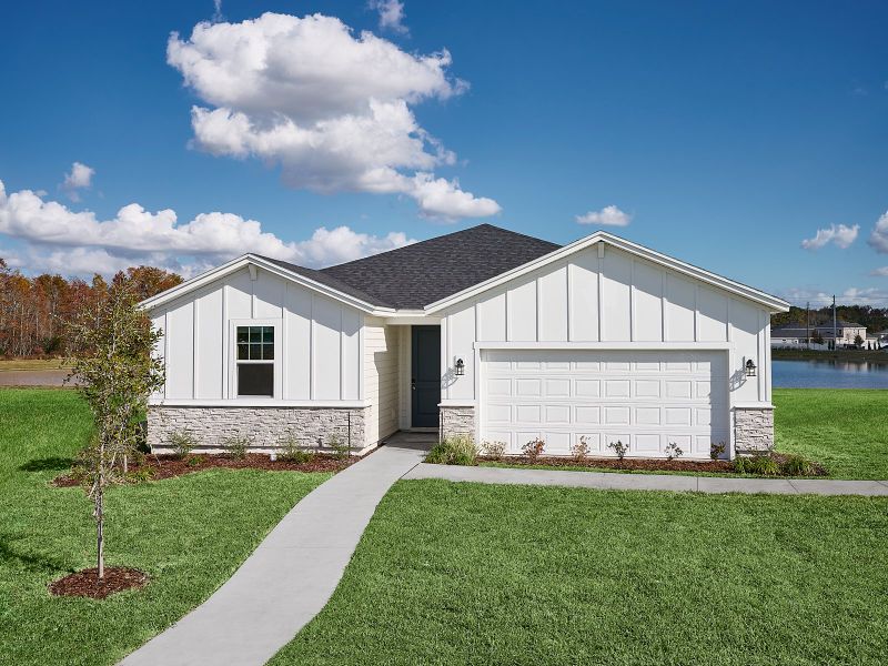 Front exterior of a home in the Cypress Meadows - Signature Series community, located in Jacksonville, FL (Image 4). Front exterior of a home in the Cypress Meadows - Signature Series community, located in Jacksonville, FL (Image 4).