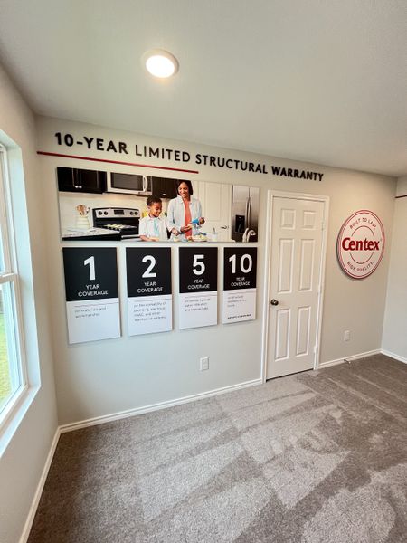 A modern room showcasing Centex's 10-year warranty details on a stylish display wall. A modern room showcasing Centex's 10-year warranty details on a stylish display wall.