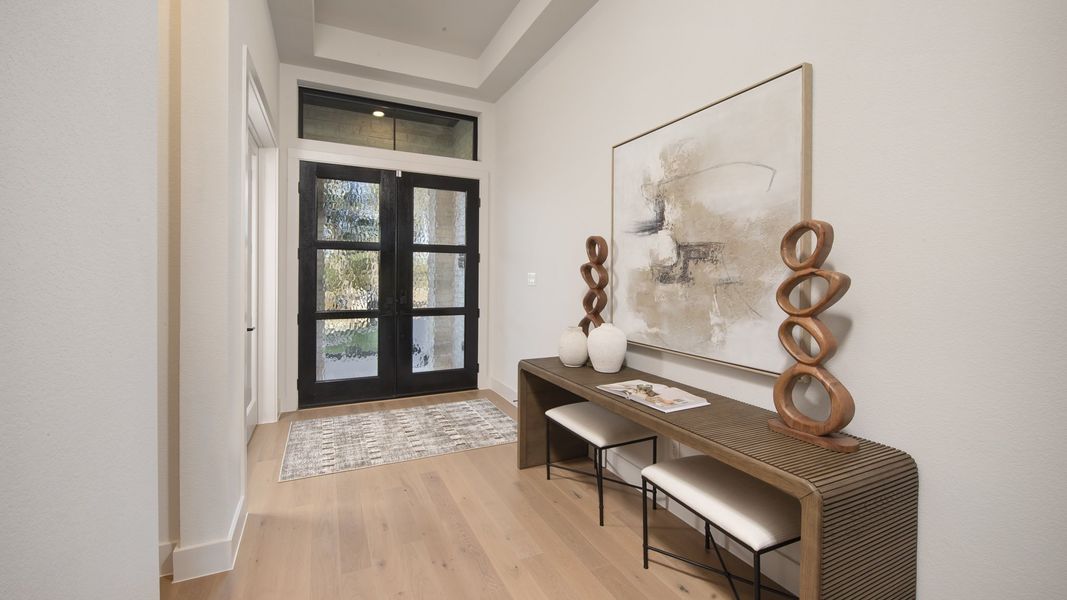 Furnished interior in a model home at Creek of Driftwood Half Acre in Driftwood (Image 6).