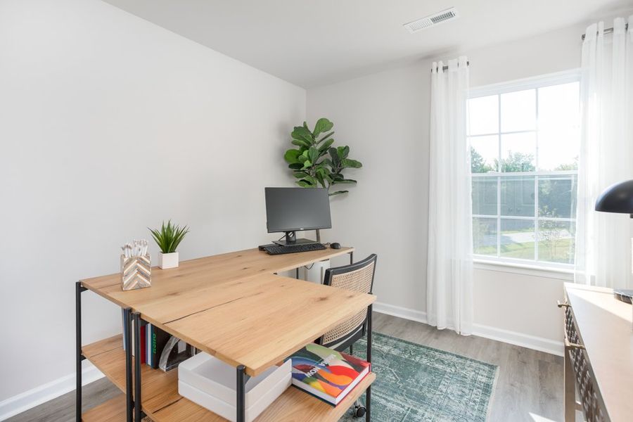 Furnished interior in a model home at Trinity Townes in Trinity (Image 14).