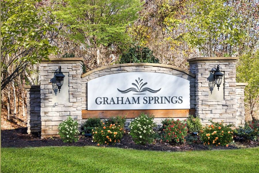 Entrance to the Graham Springs community in Graham, NC, featuring signage and landscaping (Image 1). Entrance to the Graham Springs community in Graham, NC, featuring signage and landscaping (Image 1).