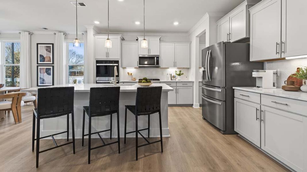 Furnished interior in a model home at Oak Grove Hill in Huntersville (Image 6). Furnished interior in a model home at Oak Grove Hill in Huntersville (Image 6).