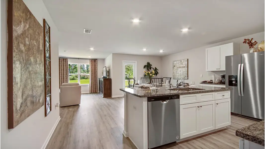 Furnished interior in a model home at Sunny Hills in Chipley (Image 6).