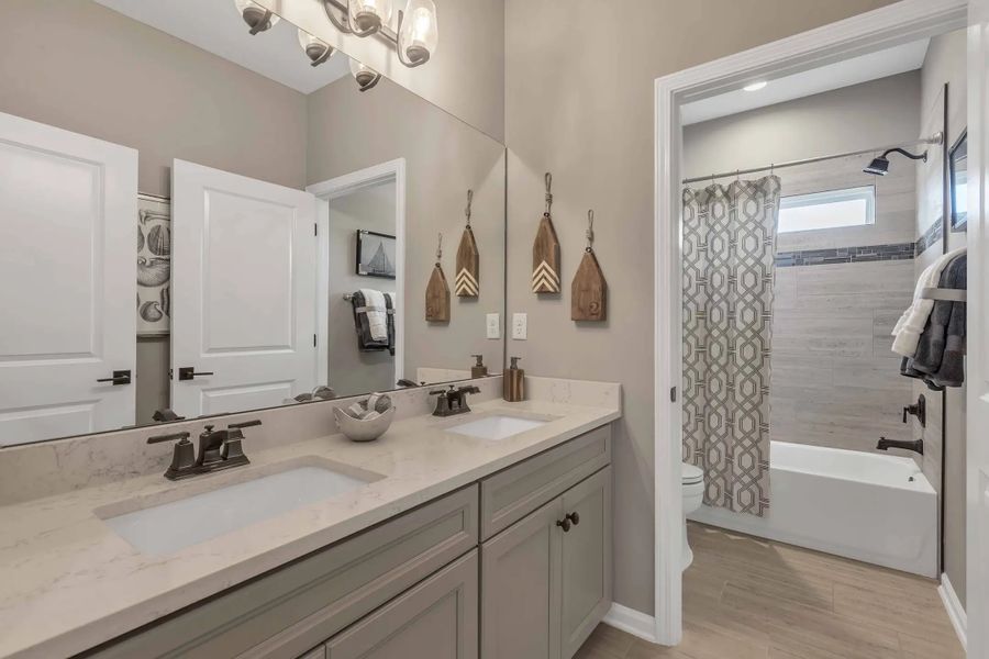 Furnished interior in a model home at Wilford Preserve 50' in Orange Park (Image 14).