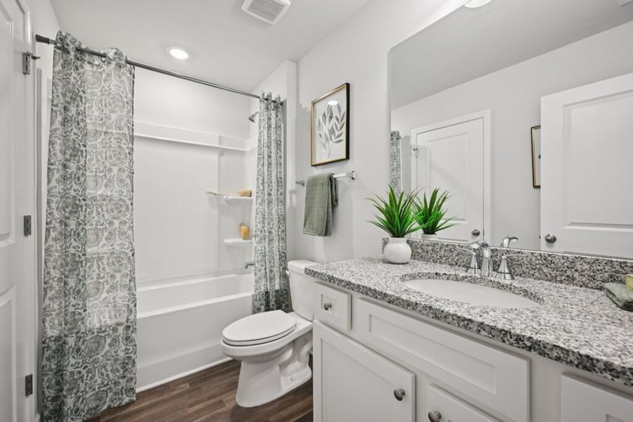 Furnished interior in a model home at Chastain Heights in Woodstock (Image 54).