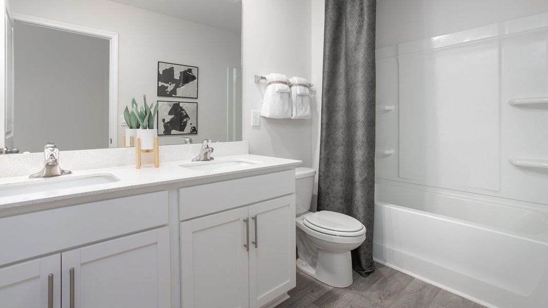 Furnished interior in a model home at Faircrest in Greensboro (Image 21).