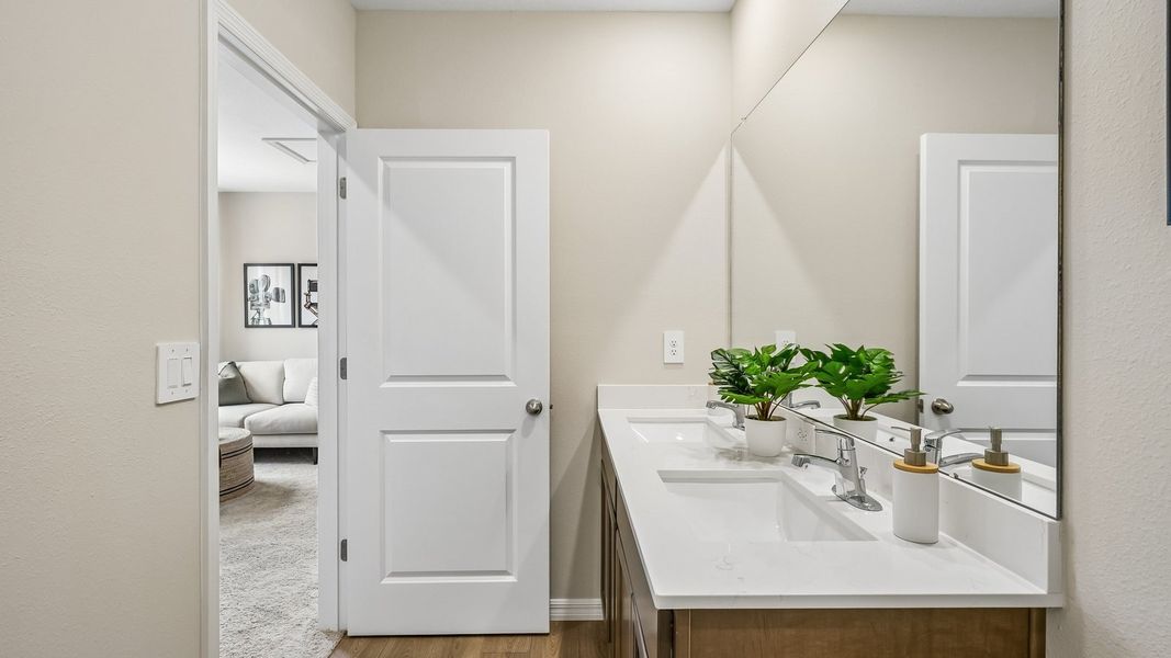 Furnished interior in a model home at Waterstone in Tampa (Image 34).