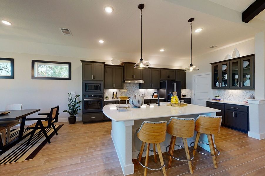 Furnished interior in a model home at The Grove at Blackhawk in Pflugerville (Image 5).