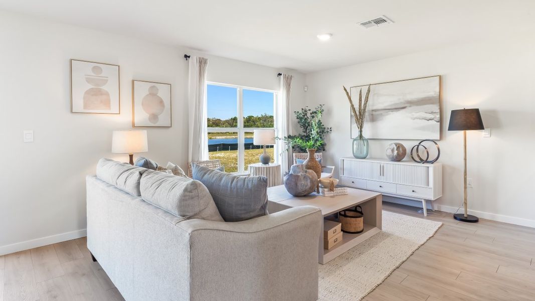 Furnished interior in a model home at Cape Coral Water & Sewer in Cape Coral (Image 17).