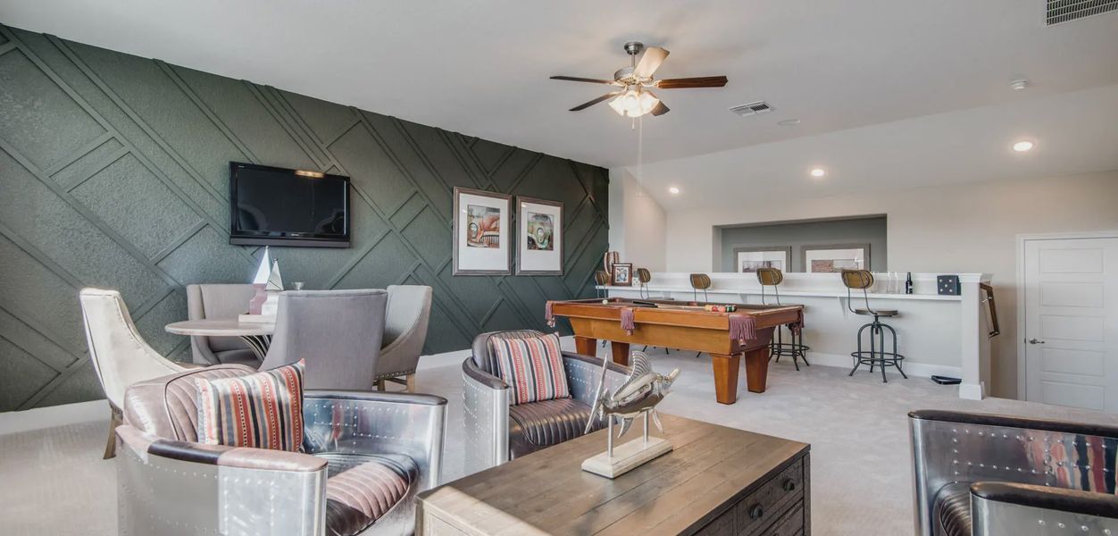 Furnished interior in a model home at Potranco Oaks 100's in Castroville (Image 6).