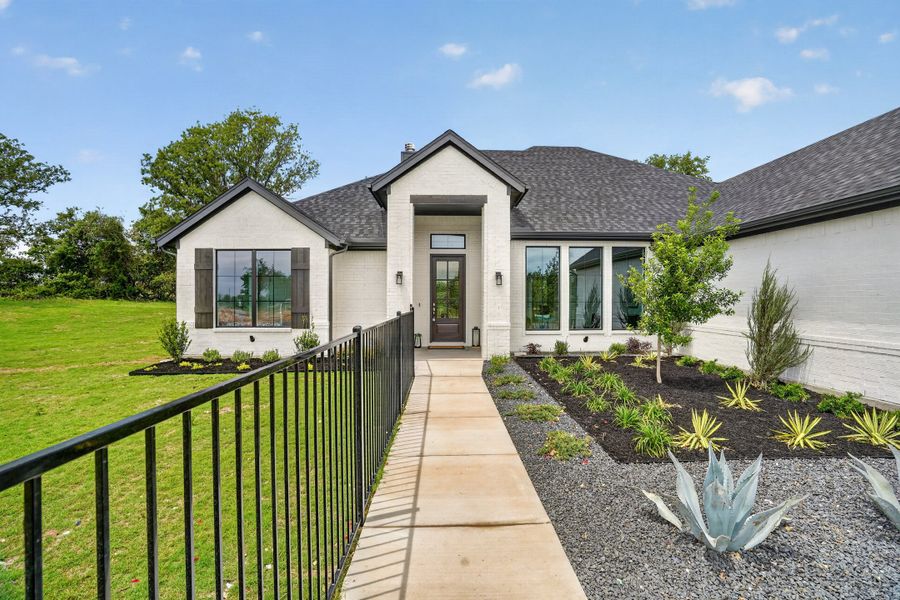Front exterior of a home in the Terra Vista Estates community, located in Springtown, TX (Image 18).
