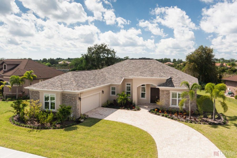 Front exterior of a home in the Laguna Village community, located in Melbourne, FL (Image 8).