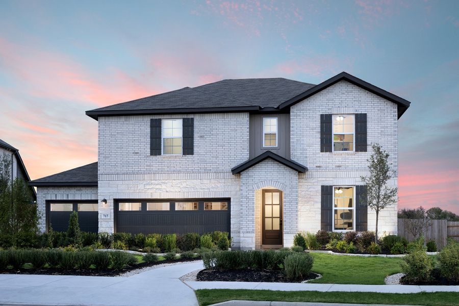 Front exterior of a home in the Venado Crossing community, located in Cibolo, TX (Image 2).