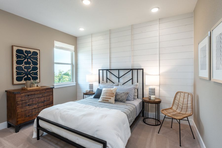 Furnished interior in a model home at Travisso Capri in Leander (Image 14).